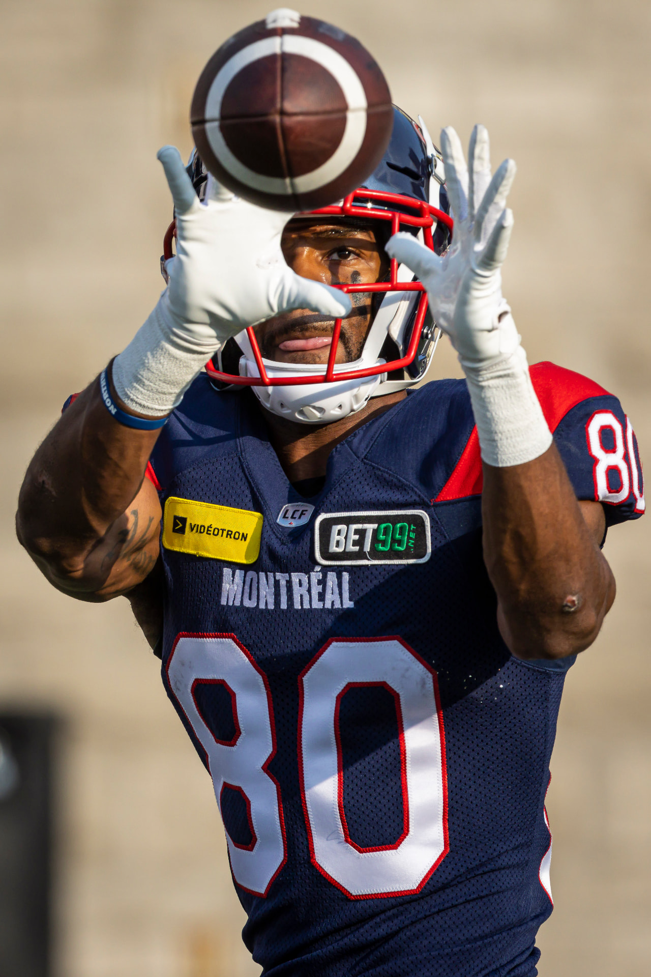 Coach Abram catching a pass in a Montreal Alouettes uniform